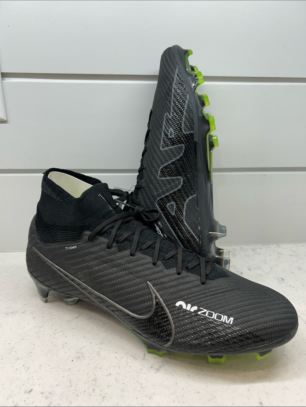 Nike Men’s Black Mercurial Elite Soccer Cleats with matching cleat bag included